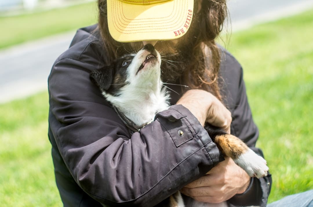 chronic pain. A person holding a dog