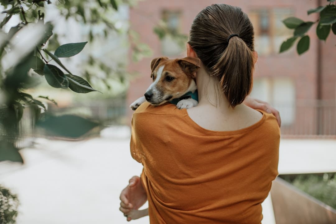 sleep disorders. Woman in orange shirt holding green plant